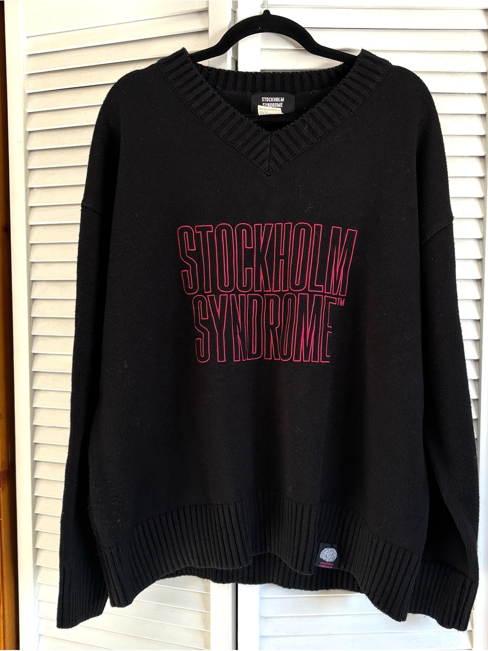 Oversized Black V-Neck Sweater with Red Logo